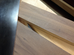 Hand sawing plywood